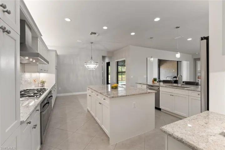 Kitchen with view of eat in dining area