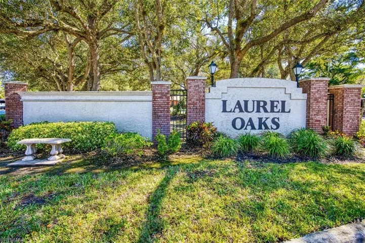 Community sign featuring a yard