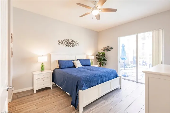 Master bedroom has pool and lake views.