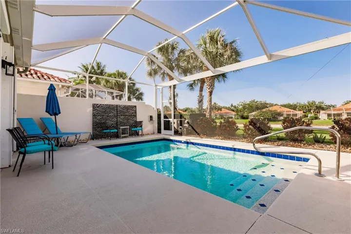 Resurfaced pool with bridge views.