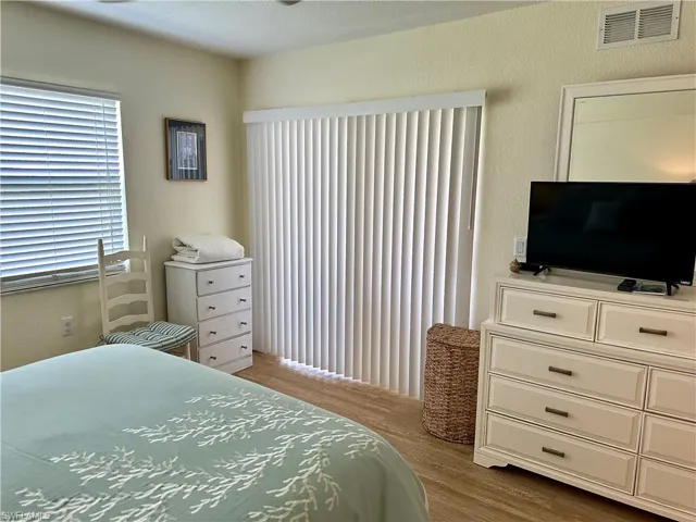 There is natural light from the window and the sliding door to lanai.