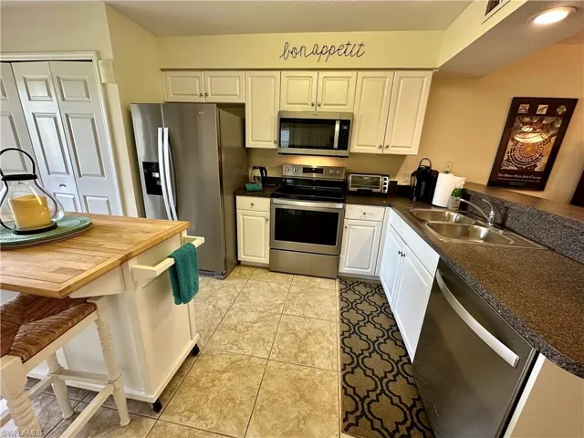Generous L shaped counter top for plenty of work area.