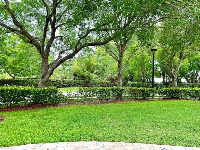 Beautiful mature landscaping creates a lush environment.