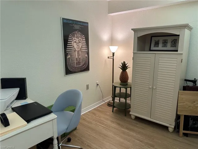 Office/den/or flex-use room, is left of the living area.