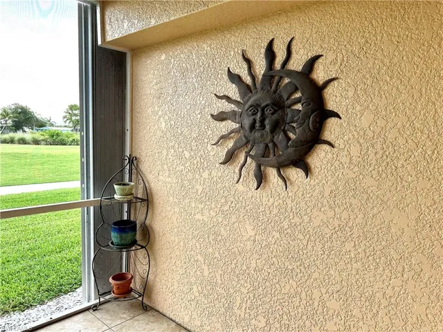 The right side has a large accordion shutter to protect the major part of the lanai.