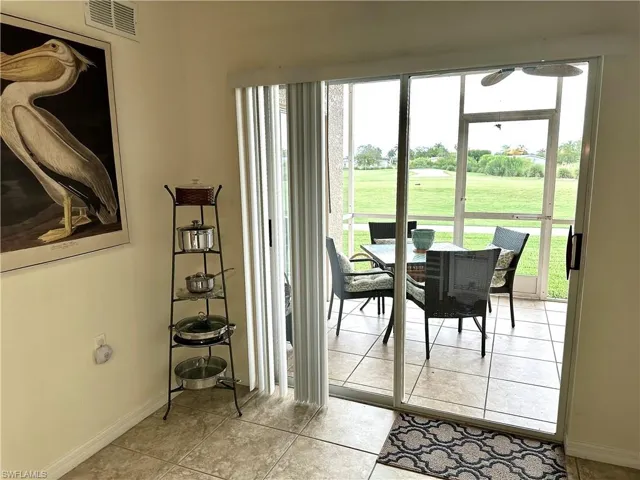 Beyond the kitchen is the screened lanai.
