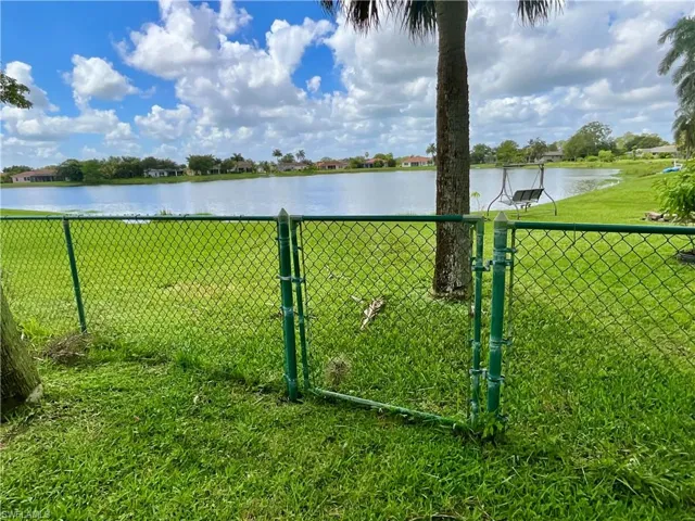 Water view with a gate