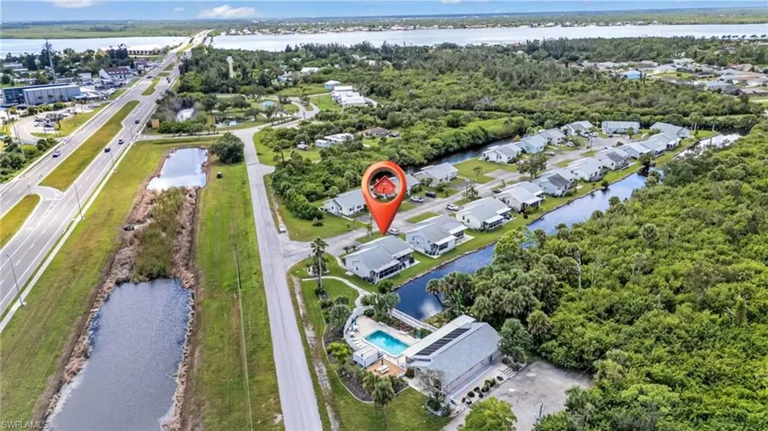 View of property location with a nearby body of water