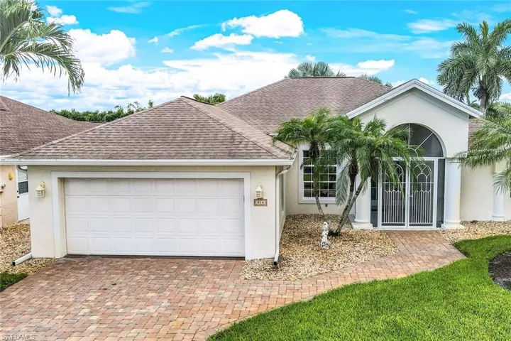 Ranch-style home featuring a garage