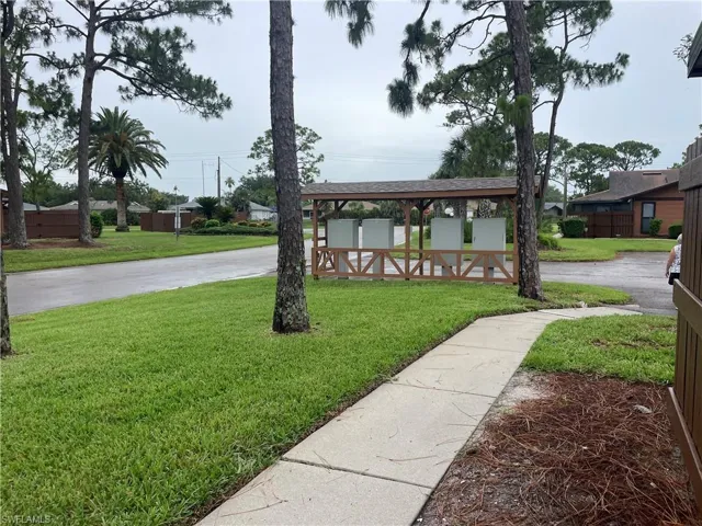View of community featuring a lawn