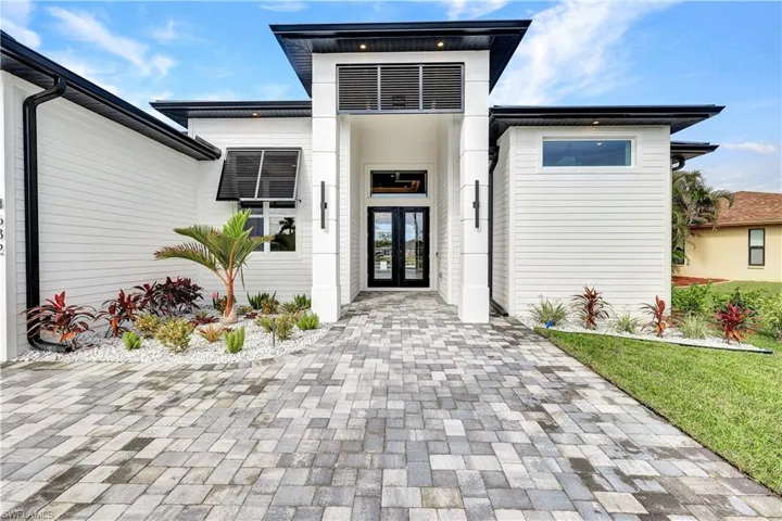 Entrance to property featuring french doors