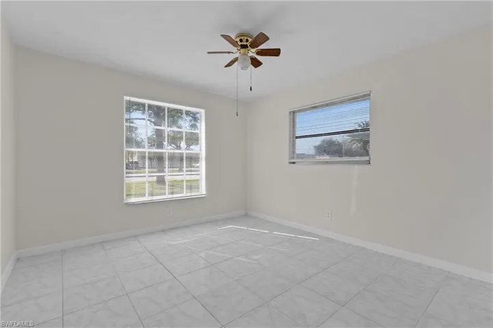 Spare room with plenty of natural light and ceiling fan