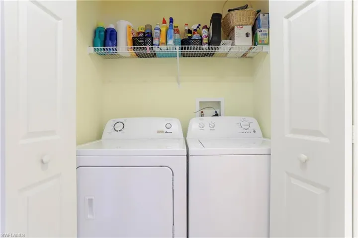 Laundry room with washer and dryer