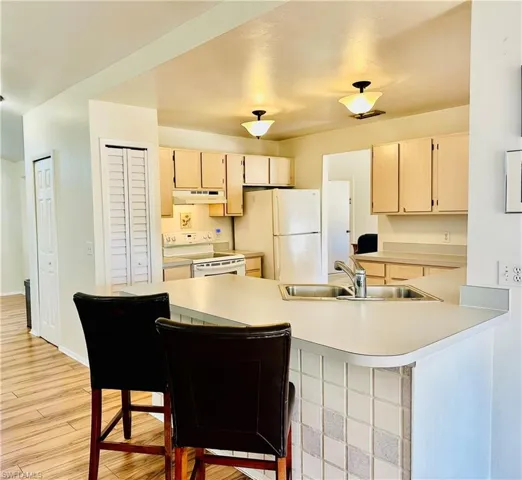 Kitchen featuring a kitchen breakfast bar