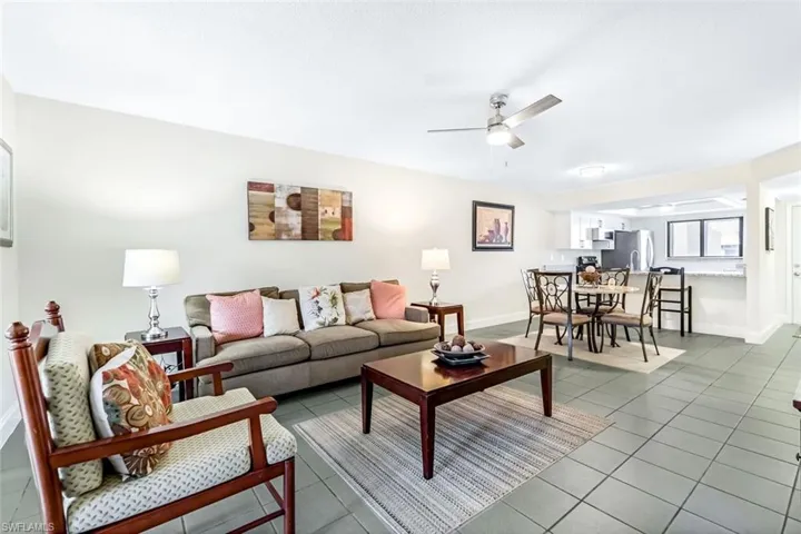 Tiled living room with ceiling fan
