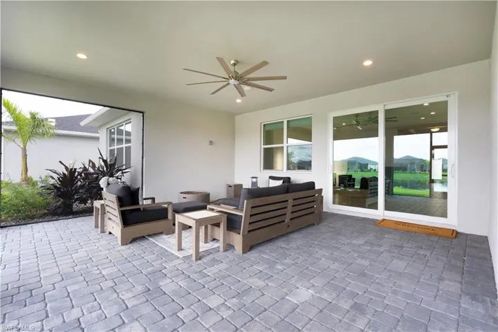 View of patio / terrace with an outdoor hangout area and a ceiling fan