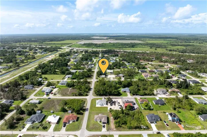 View of property location featuring nearby suburban area
