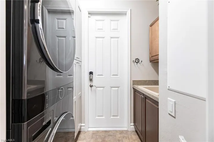 Off the kitchen to the garage.