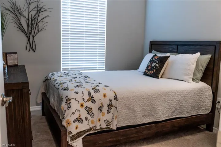 Bedroom with carpet