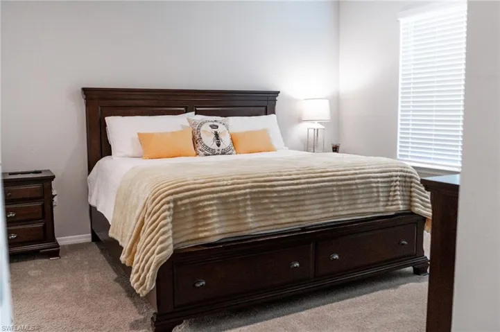 Bedroom with carpet