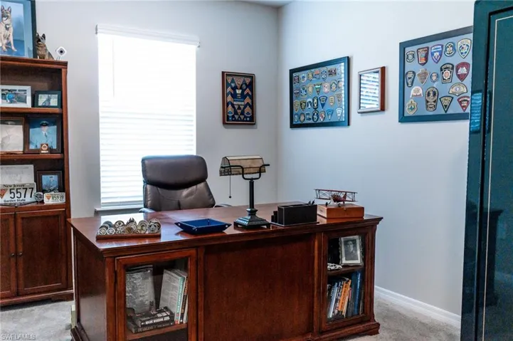 View of carpeted home office
