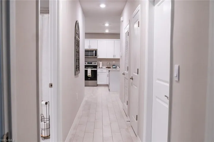 Hall featuring light hardwood / wood-style flooring
