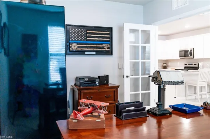 Office featuring hardwood / wood-style flooring