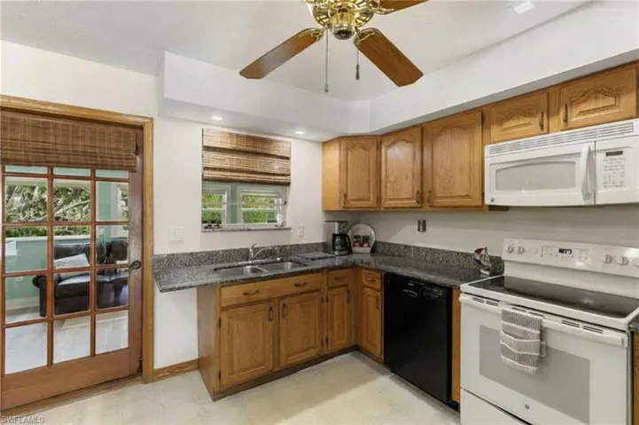 Kitchen access to enclosed porch/Florida room
