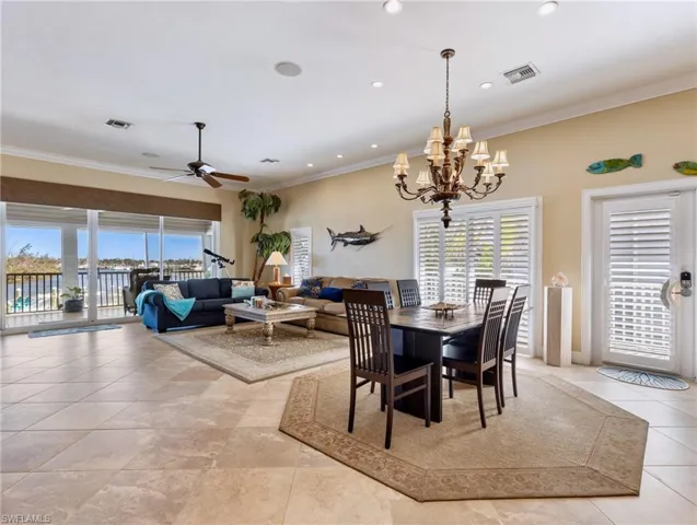 French doors open to a wrap around deck