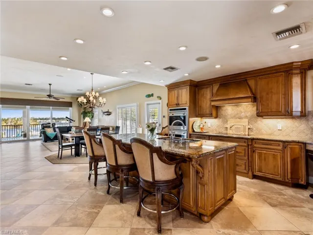 Kitchen and Great Room with high ceilings and lots of light