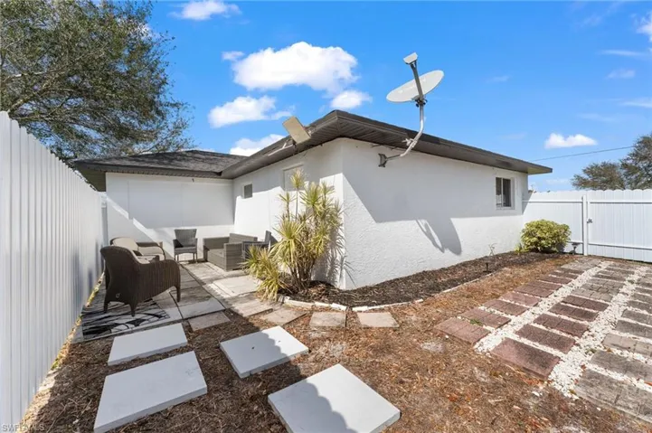 Back of house featuring an outdoor hangout area and a patio