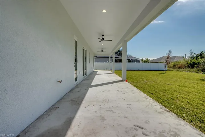 View of patio with a ceiling fan