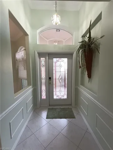 Foyer to Glass stained door