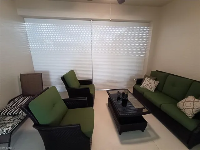 Lanai with electric storm shutter down