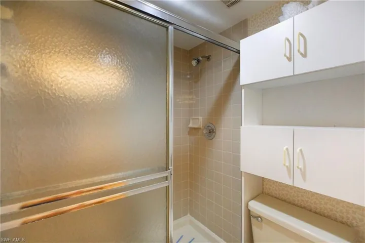 Bathroom featuring a shower stall
