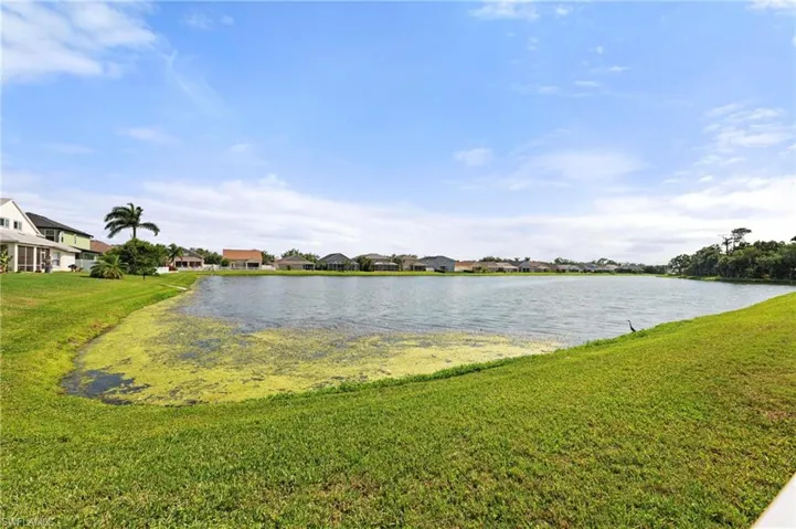 Water view featuring nearby suburban area