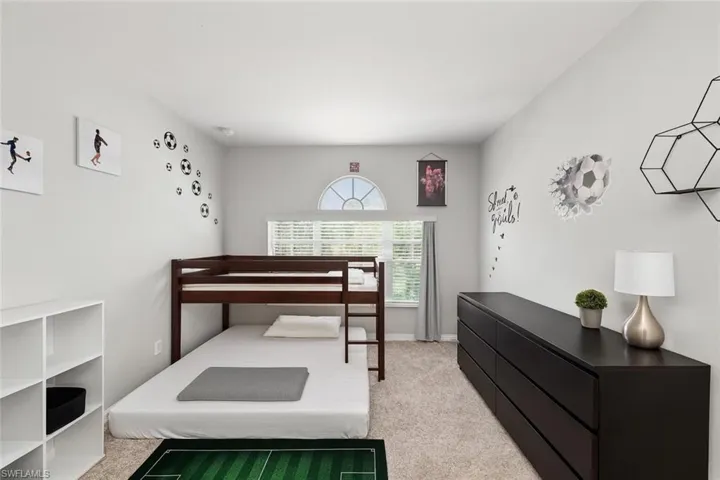 Virtually staged -Bedroom with light colored carpet