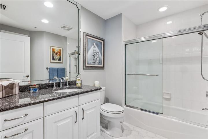Large Guest Bath with updated tub/shower, toilet and quartz countertop