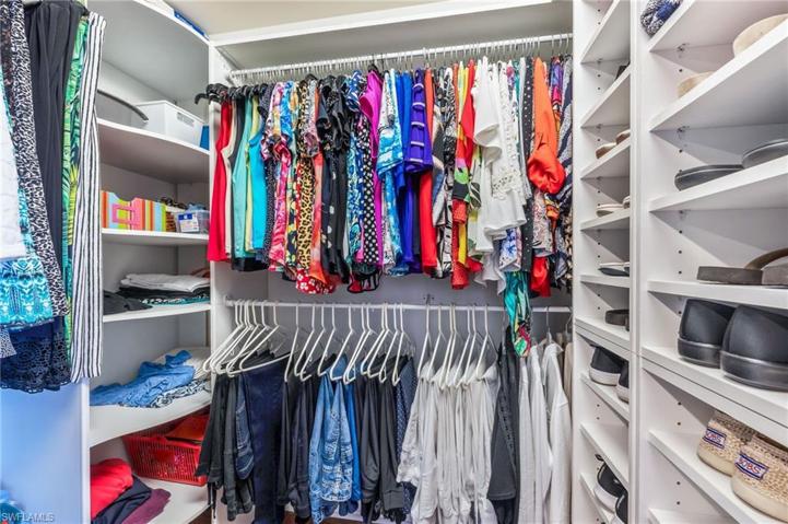 Master Closet With Lots Of Shelves For Storage