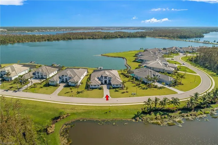 Enjoy water views from the east and west, an oversized lot with over 1/2 acre, your own private dock, and interior designs and features that you will LOVE.