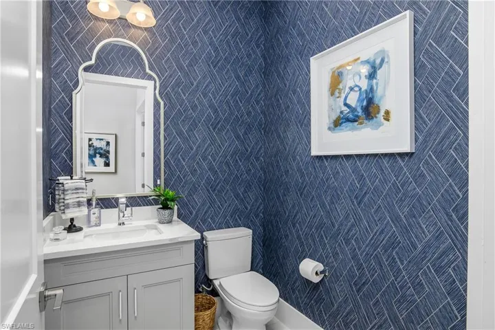 Bathroom with vanity and toilet