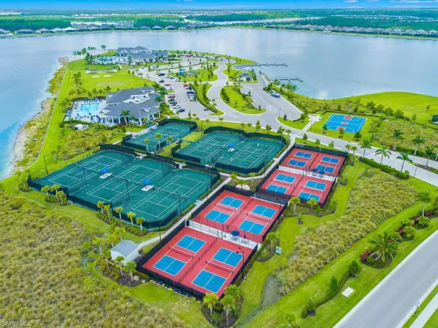 Join our active pickleball and tennis community with 8 pickleball courts, & 6 tennis courts. Also pictured is the full basketball court, Sports Club with lap pool and fitness center, and bocce courts in the distance.