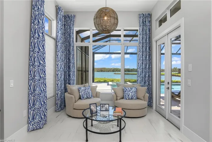 Living area featuring a water view