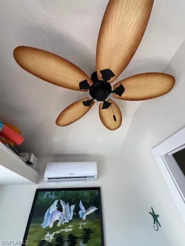 Room details featuring a wall mounted air conditioner