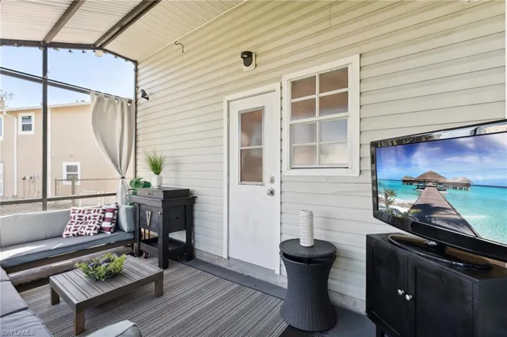 Wooden deck featuring an outdoor living space