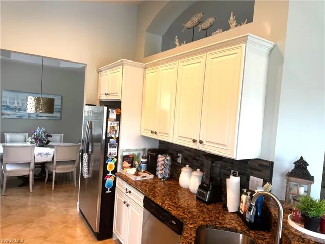 Kitchen with stainless steel appliances and recently refreshed cabinets