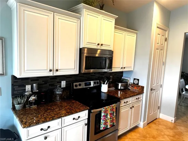 Kitchen with recently refreshed cabinets