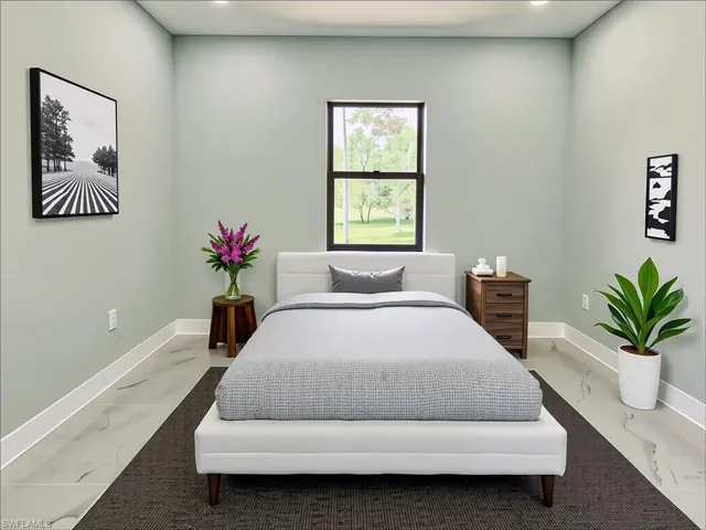 Bedroom with baseboards