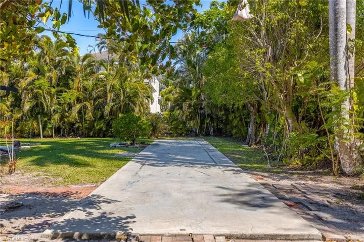 Private sideyard shuffleboard/RV pad
