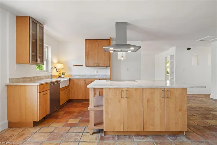 Solid wood cabinets with marble counters